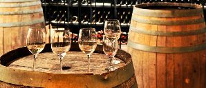 wine glasses and wine barrels